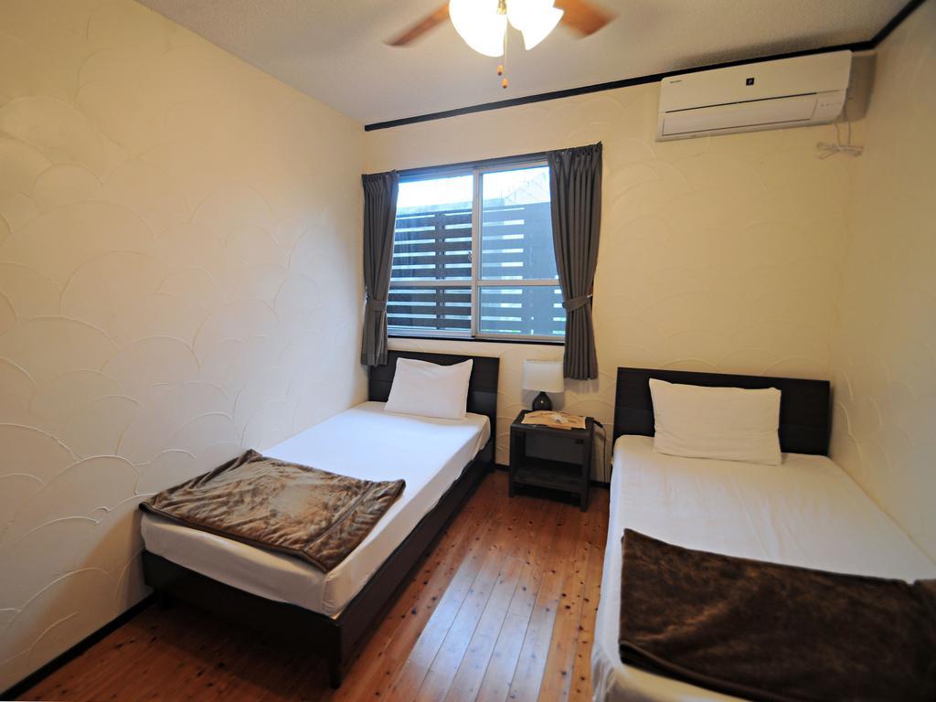 Nakijin No Yado Hibiscus Hotel Bagian luar foto